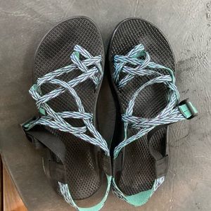 Black and turquoise Chaco’s size 9